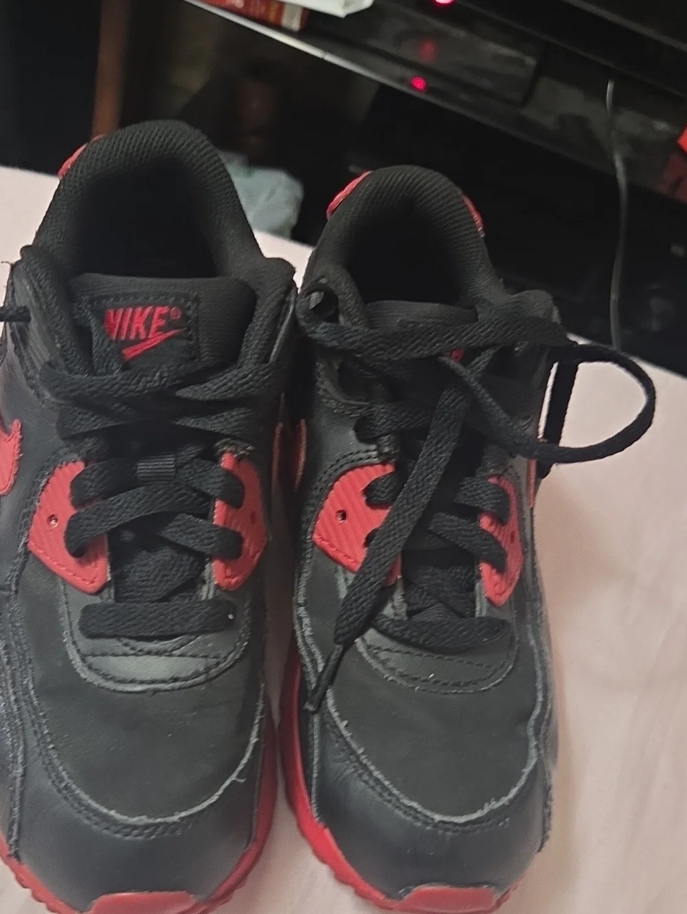 Nike Kids Black Sneakers with Red Accents